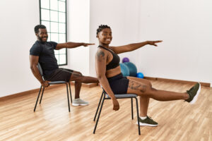 couple doing chair exercises
