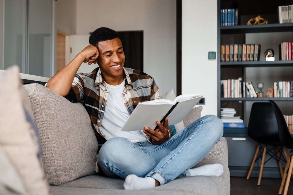 man reading book